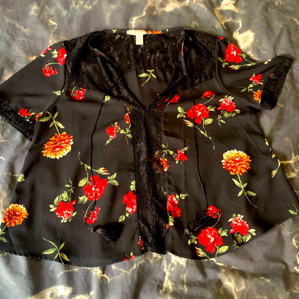 Sheer black top with flowers and lace detailing